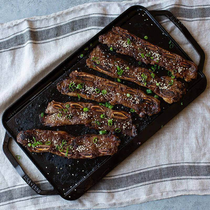 lodge reversible griddle with lift handles